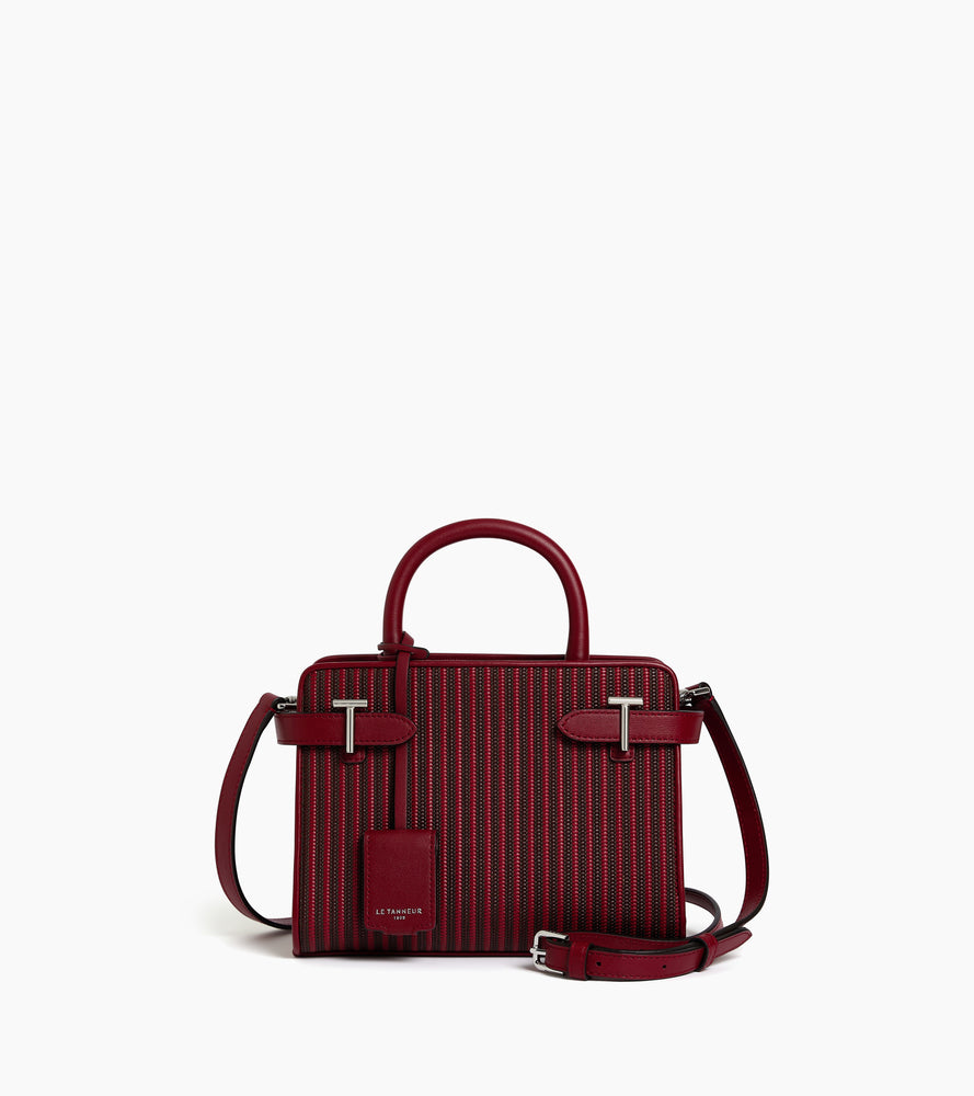 Pequeño bolso de mano Emilie en cuero trenzado